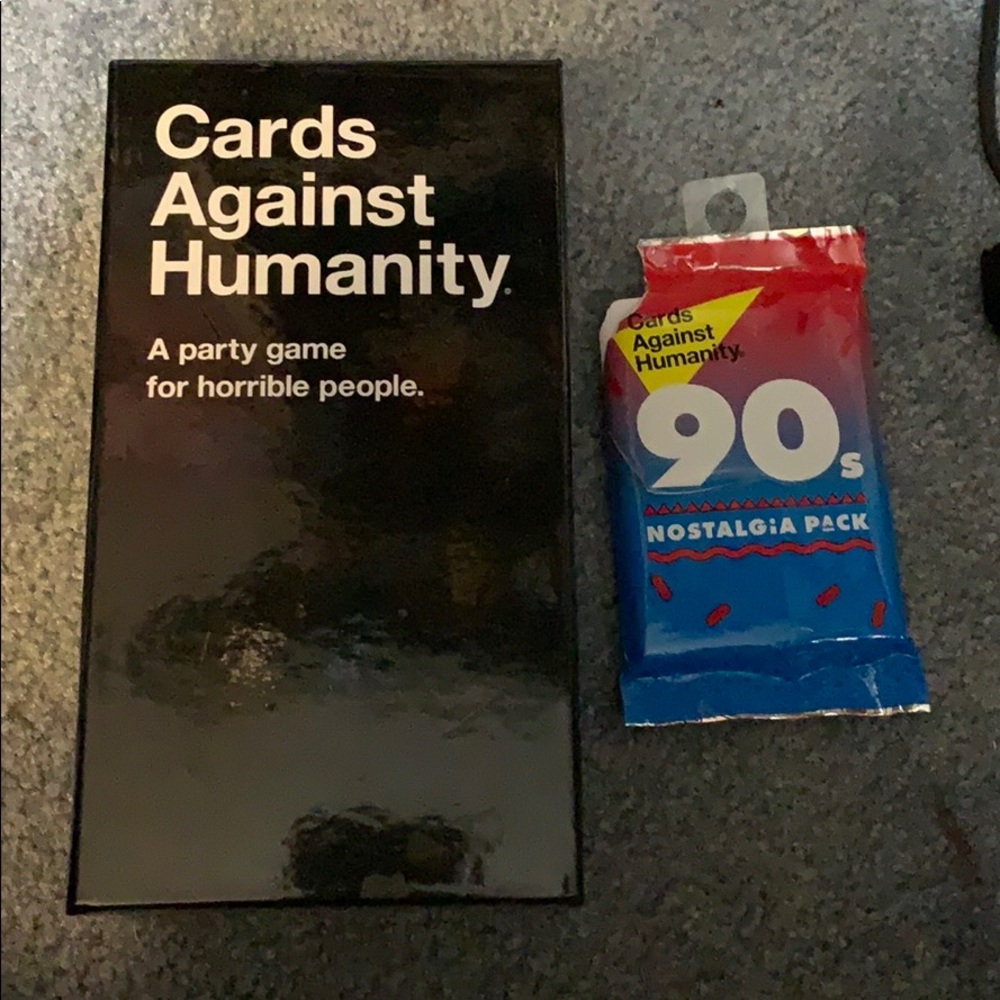 Cards Against Humanity with booster pack